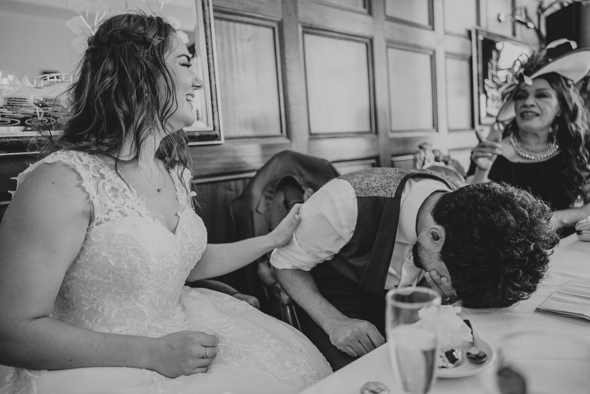 Danny puts his head on the table at The Atlantic Hotel, during an embarrassing speech moment.