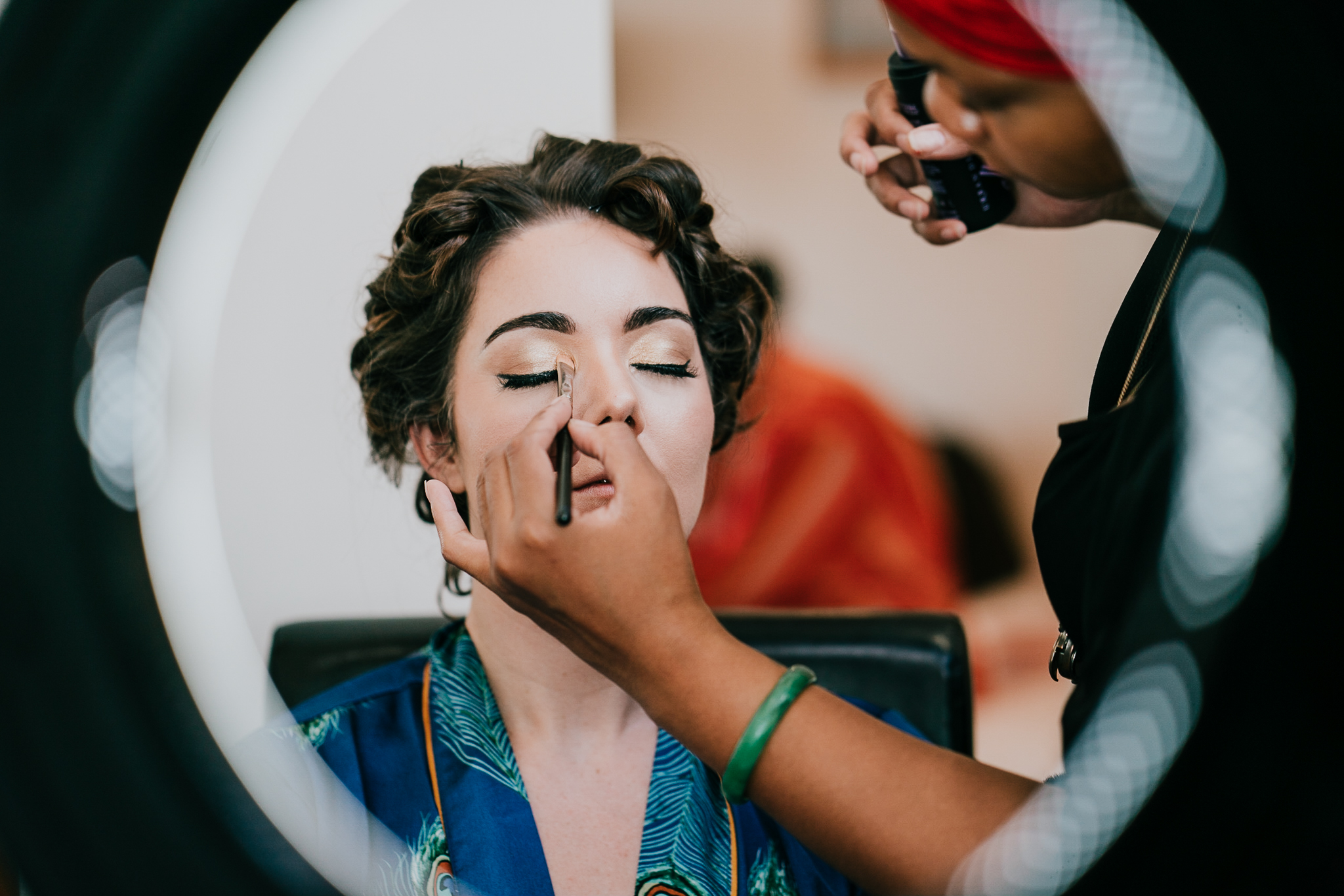 Bride having make up applied at The Atlantic Hotel, shot through a ring light.