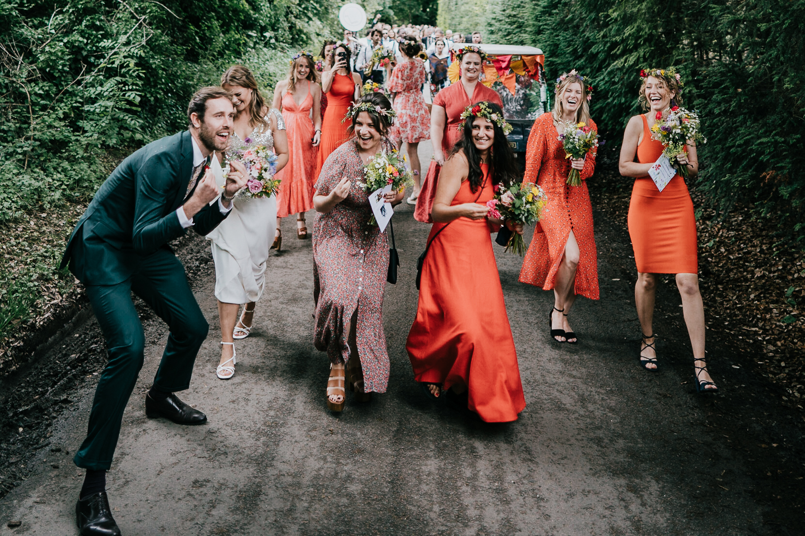 baldock-wedding-photographer 2 – Alan Law Photography The wedding party singing and dancing as they walked between their All Saints Church ceremony to their private home reception.