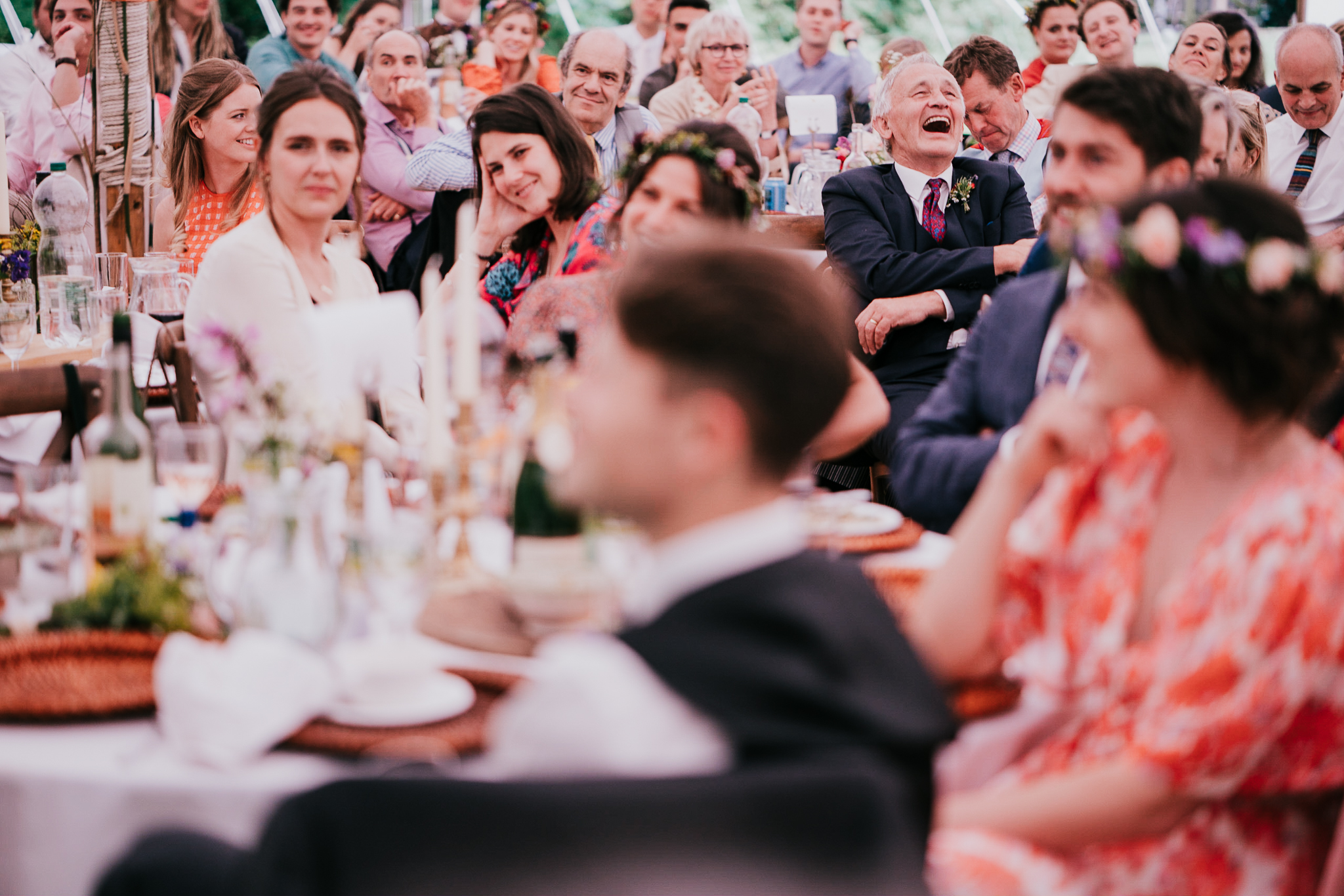 baldock-wedding-photographer 8 – Alan Law Photography Danny's Dad laughing loudly during the speeches, whilst everyone else looks nonplussed.