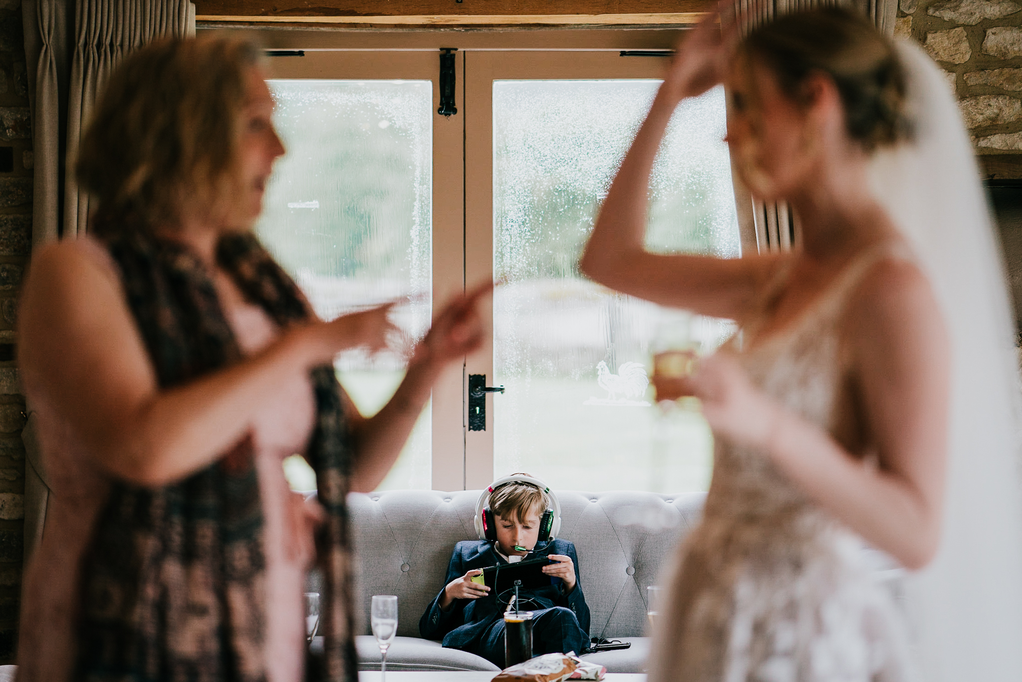 A young guests escapes the wedding to catch up on some Nintendo Switch action.