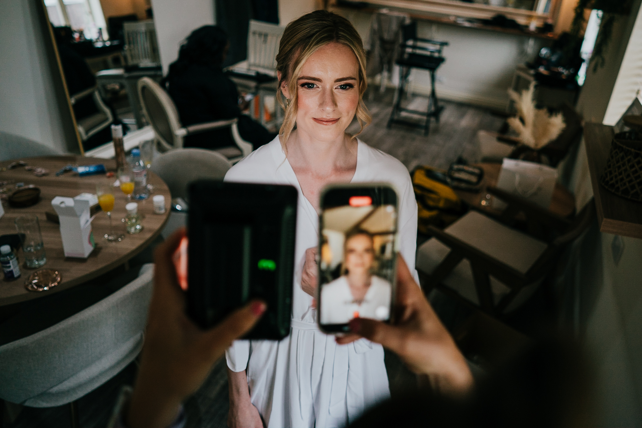 Poppy being photographed by the MUA at Caswell House.