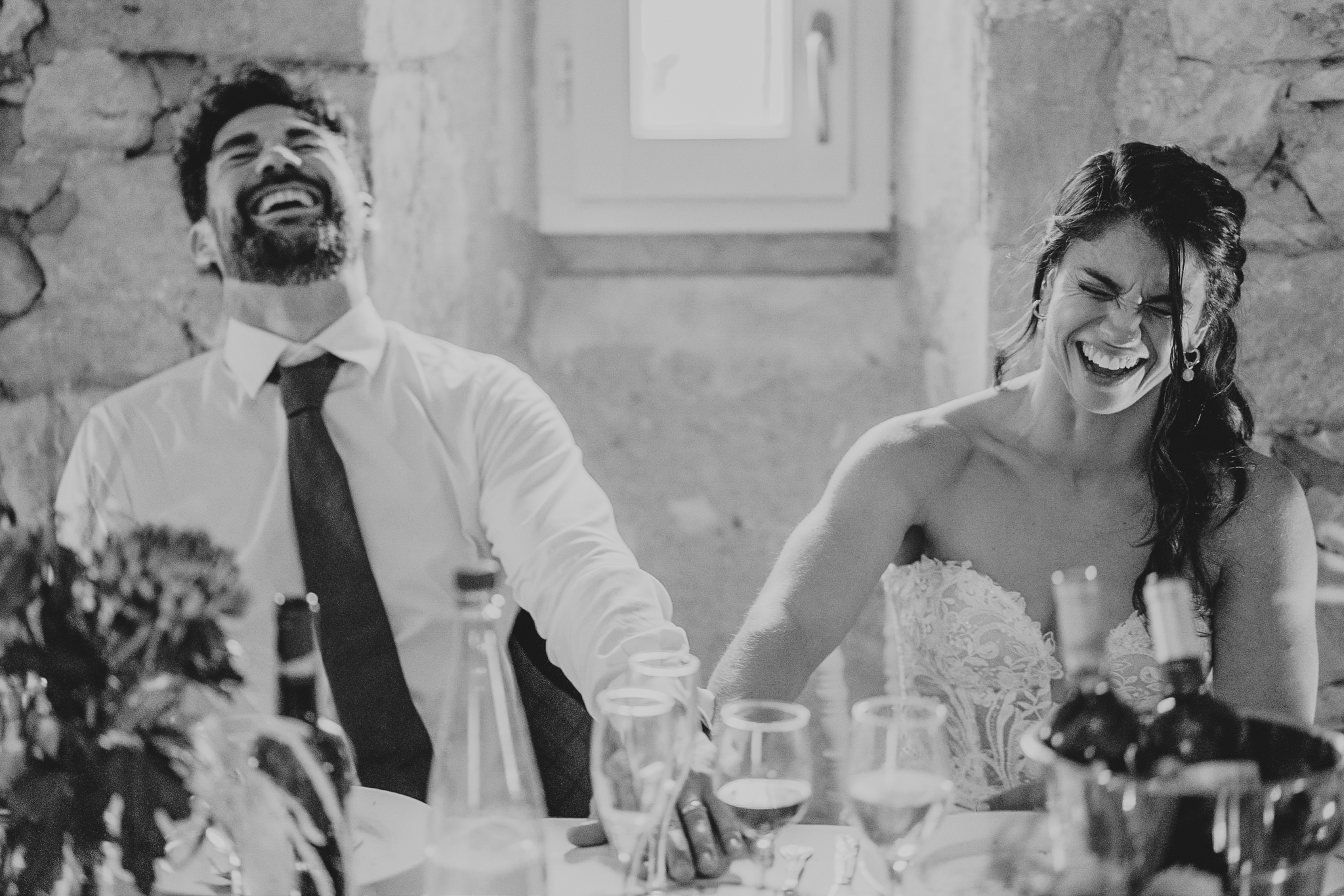 chateau-de-st-paul-wedding-photographer 4 – Alan Law Photography The bride and groom both laughing loudly during speeches at Château de St Paul.