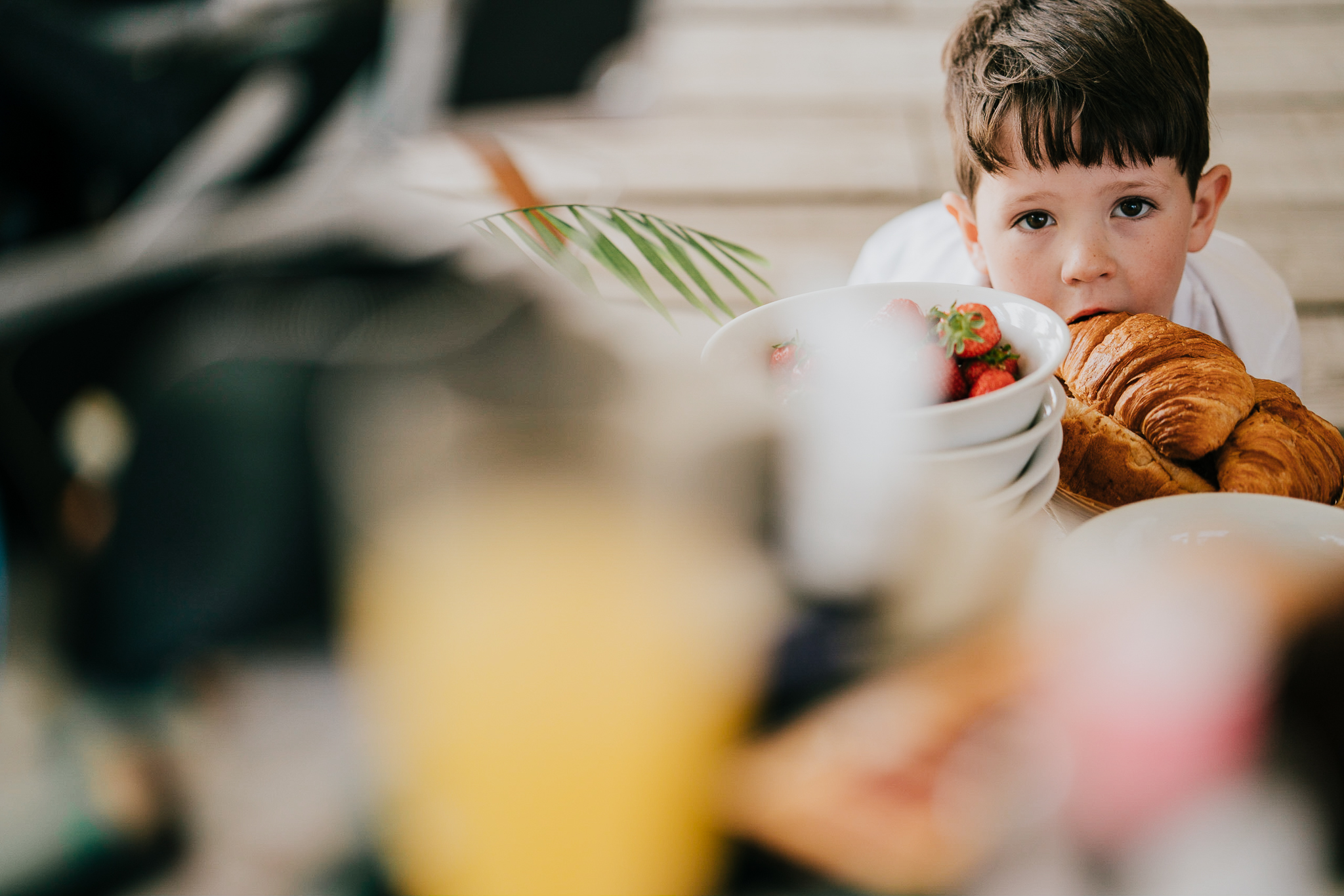 cornish-tipi-weddings-photographer 1 – Alan Law Photography A young guest enjoys a morning croissant.