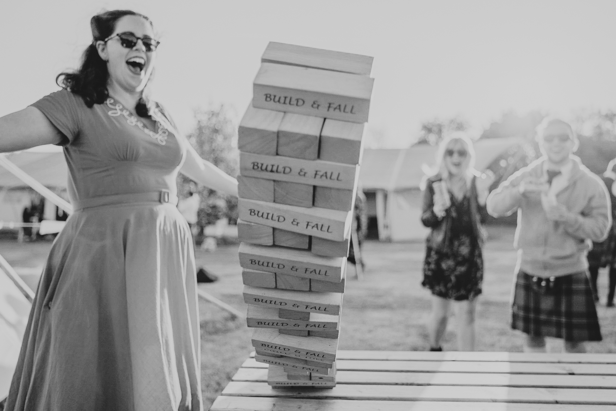 cornish-tipi-weddings-photographer 9 – Alan Law Photography A Giant Jenga falls during garden games at Cornish Tipis