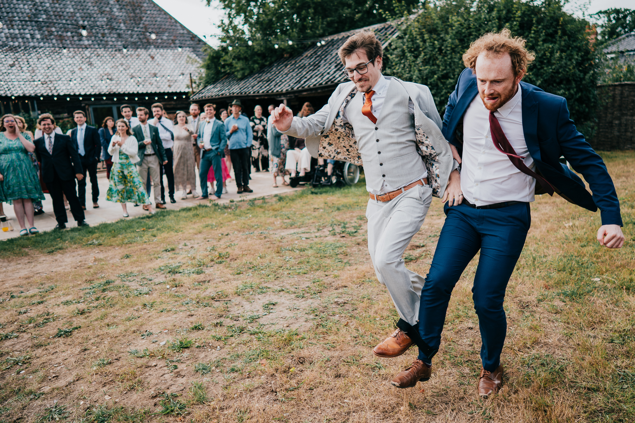 henham-park-wedding-photographer 6 – Alan Law Photography A three-legged race at Henham Park.