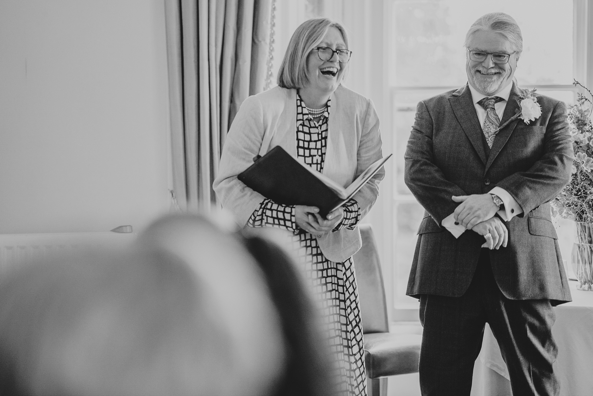 Groom and registrar sharing a laugh before the ceremony at The Horn of Plenty.
