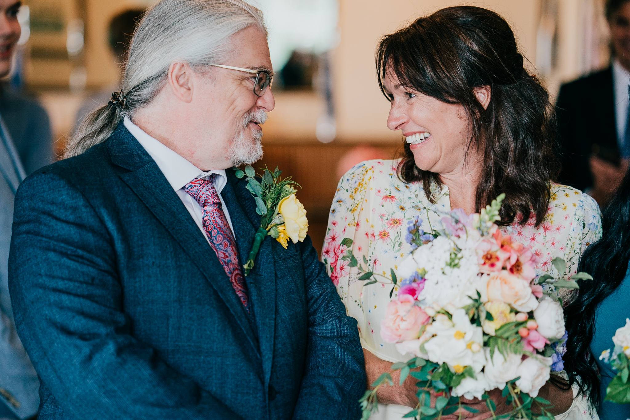 Groom and bride sharing a look during their ceremony at The Horn of Plenty