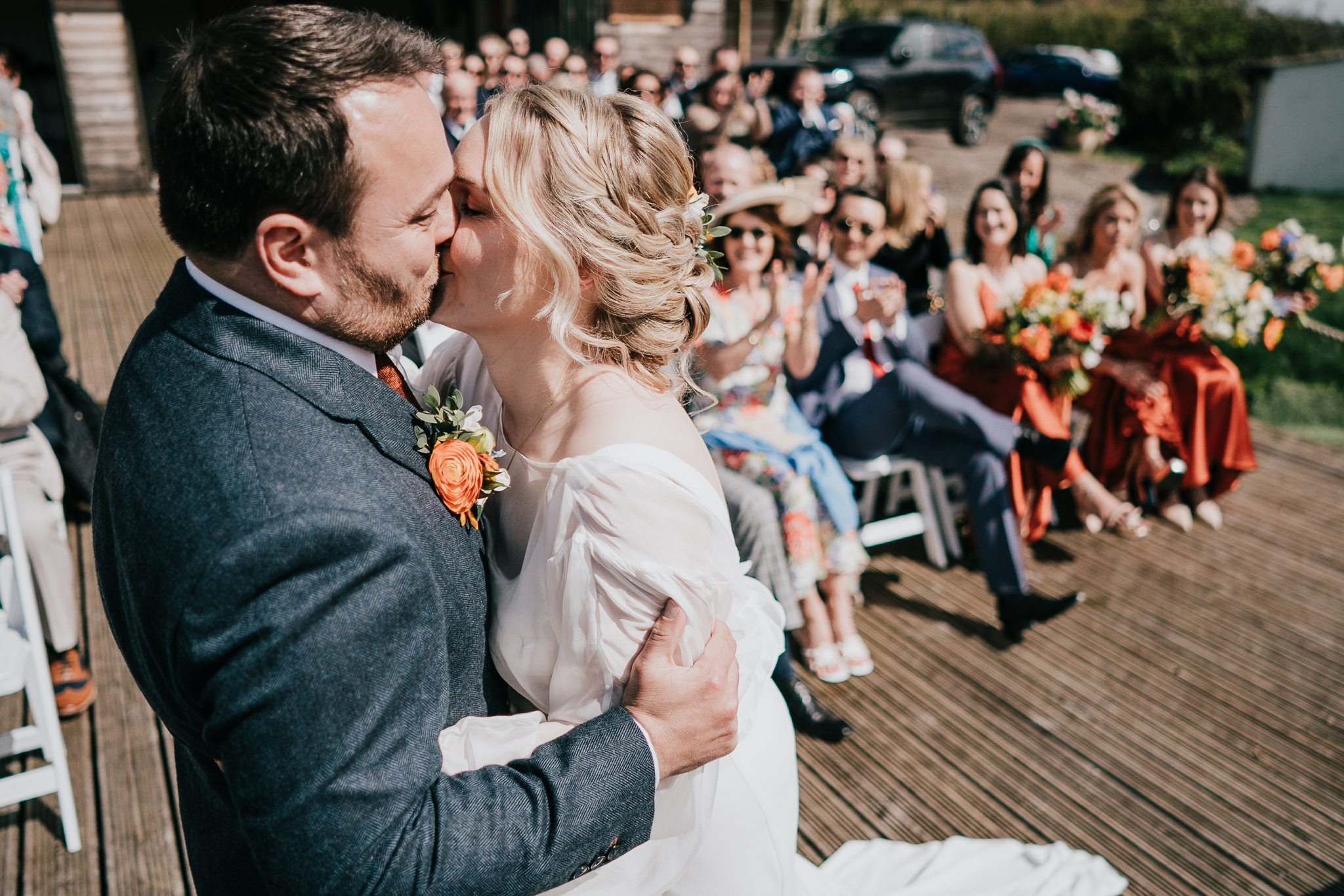 north-cadbury-court-wedding-photographer 1 – Alan Law Photography A bride and groom share their first kiss outside at North Cadbury Court.