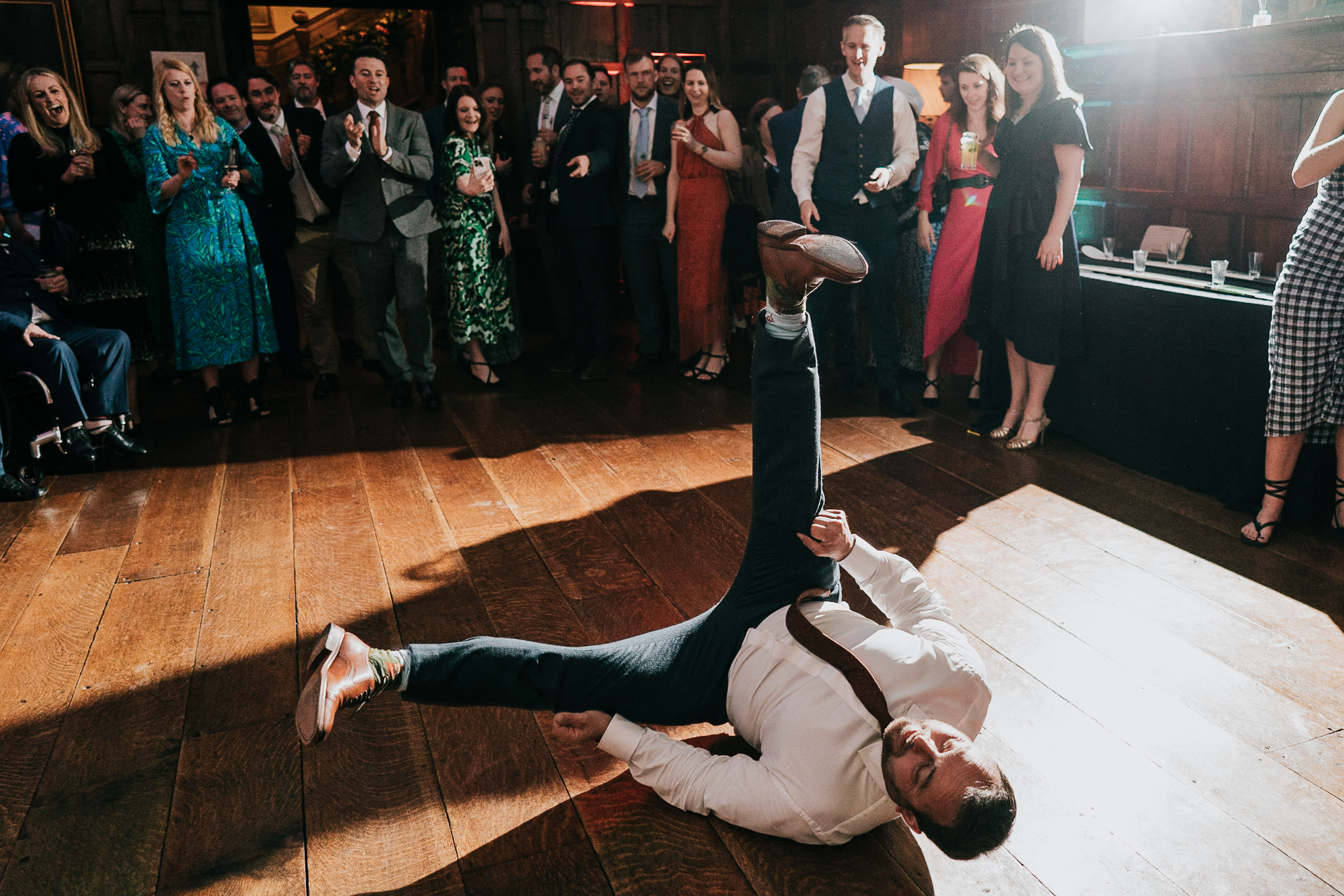 north-cadbury-court-wedding-photographer 3 – Alan Law Photography Groom breakdancing on the North Cadbury Court dancefloor.