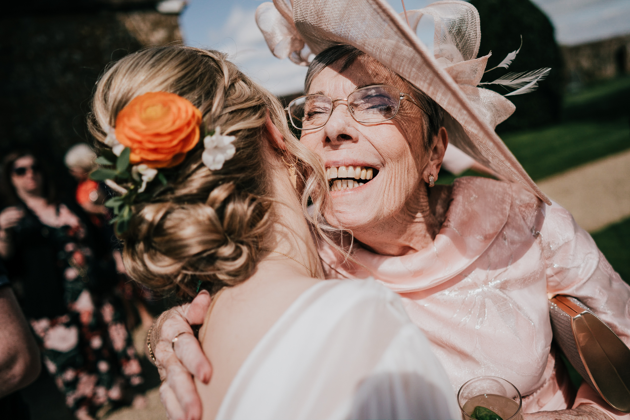 north-cadbury-court-wedding-photographer 8 – Alan Law Photography Bride and Mother of the Groom embrace at North Cadbury Court