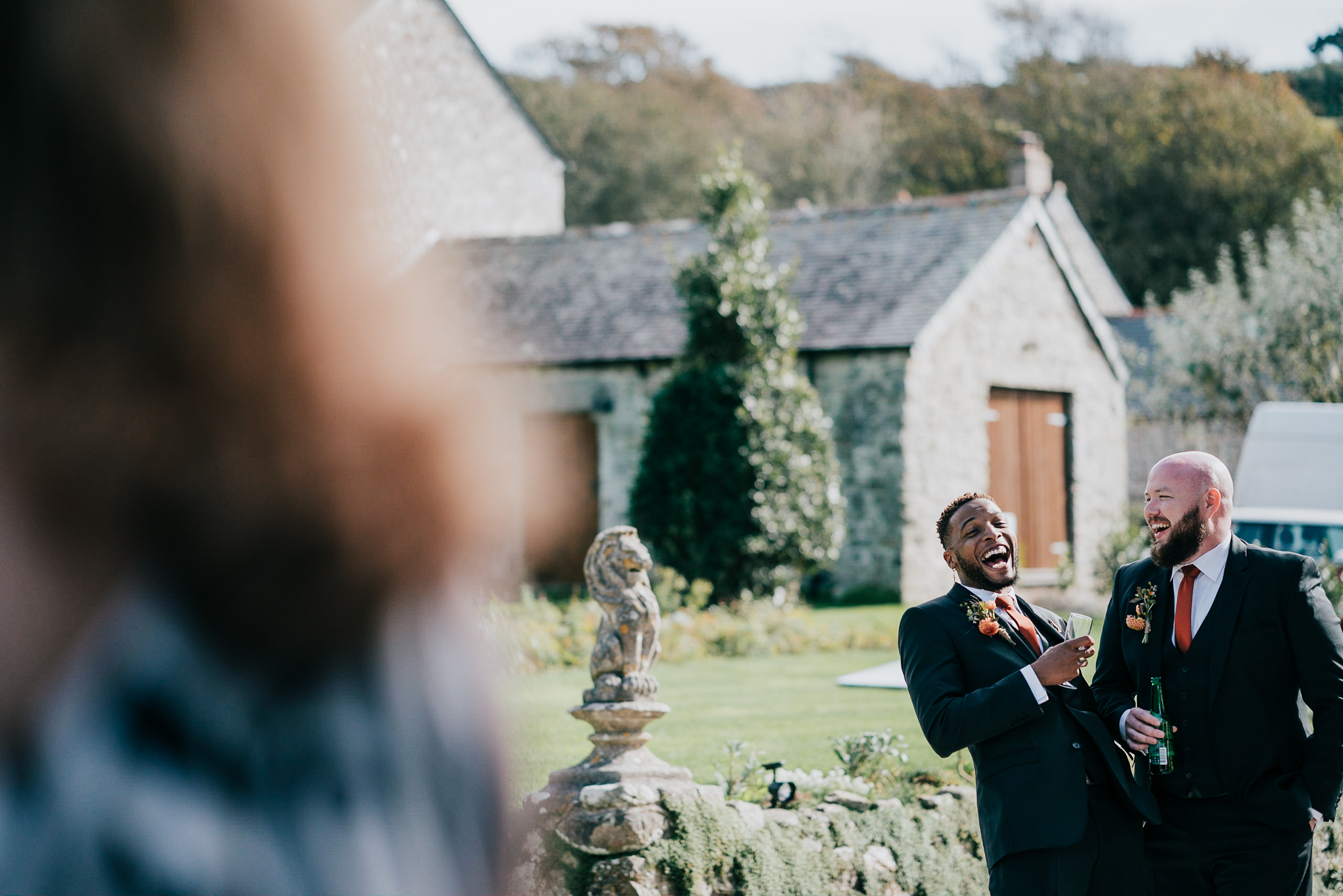 pengersick-castle-wedding-photographer 6 – Alan Law Photography The Best Man and his friend share a huge laugh at Pengersick Castle
