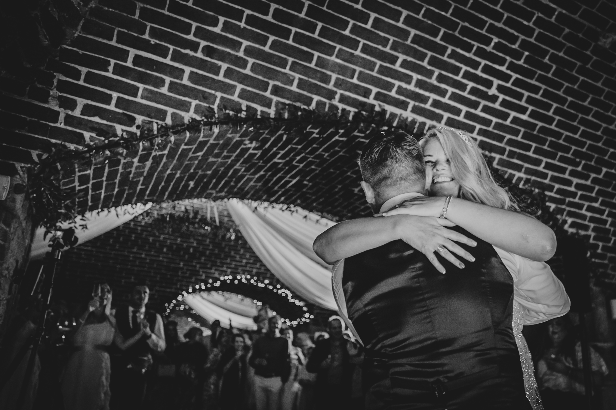 The couple hug during their Polhawn Fort First Dance.