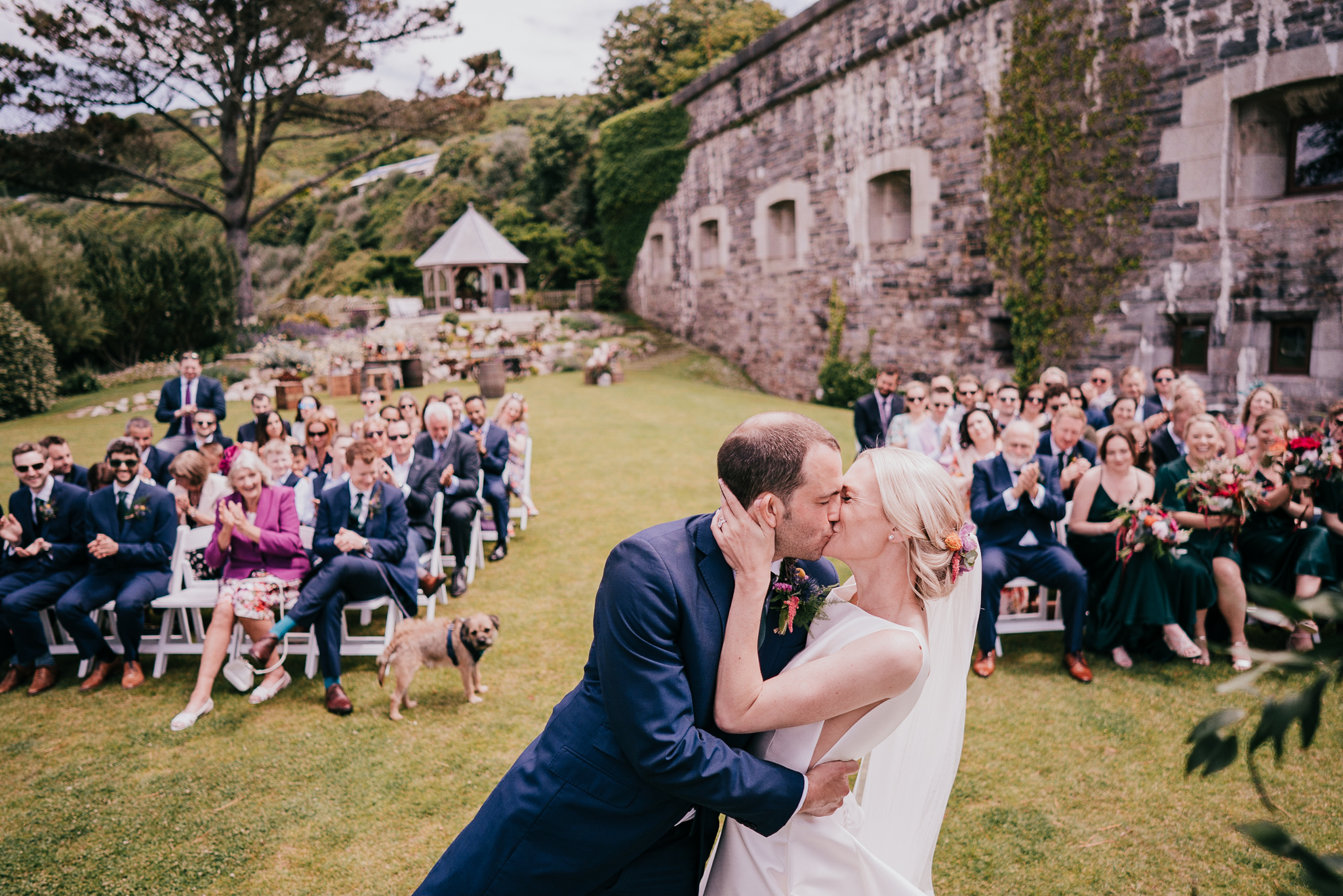 polhawn-fort-wedding-photography 4 – Alan Law Photography Shot from above, Mel & Jack have their First Kiss at Polhawn Fort whilst their family and friends applaud.