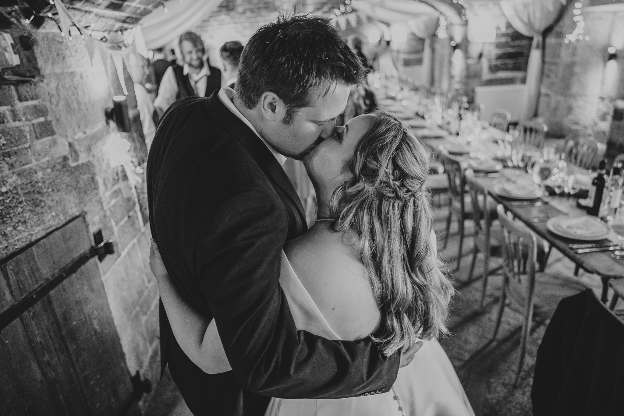 polhawn-fort-wedding-zarra-chris 8 – Alan Law Photography Chris and Zarra share a kiss before their Polhawn Fort wedding breakfast.