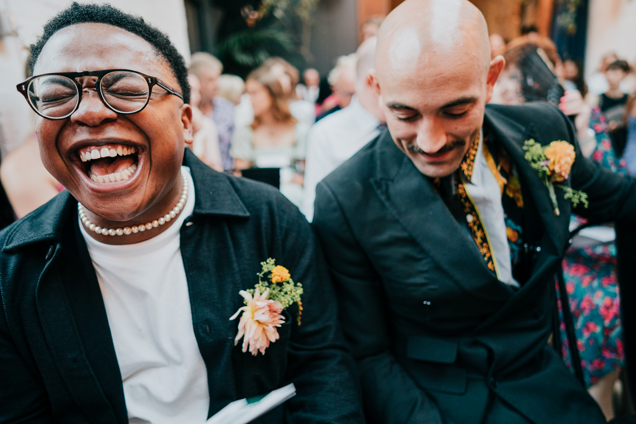 A huge laugh from the Best Man, just before the ceremony begins at The Hackney, East London.